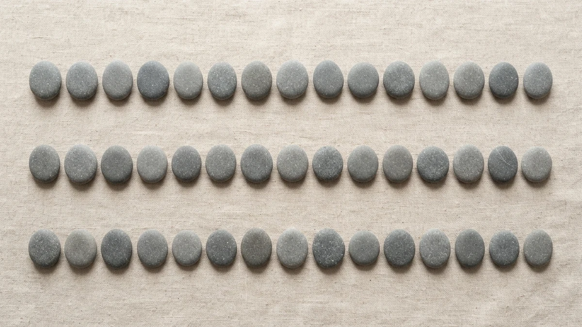 Three even rows of river stones, illustrating how one divider gives a stylish bio structure